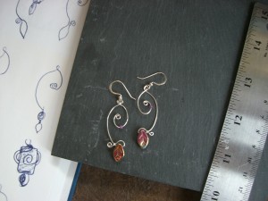 Earrings with wire spirals and glass dangles